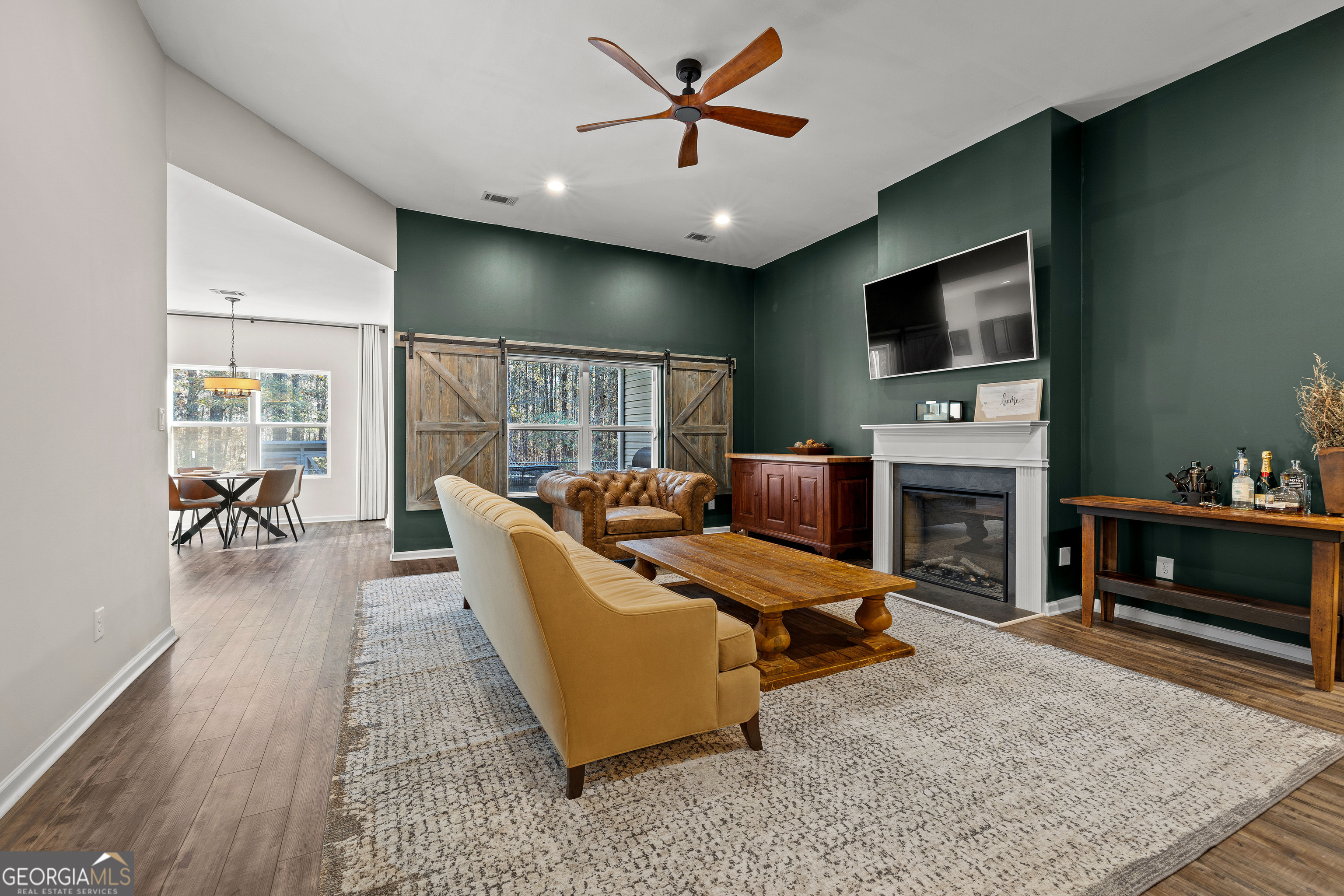 75 Homer Johnson Road Newnan, GA 30265 - Photo 13 of 51 a living room with furniture and a flat screen tv