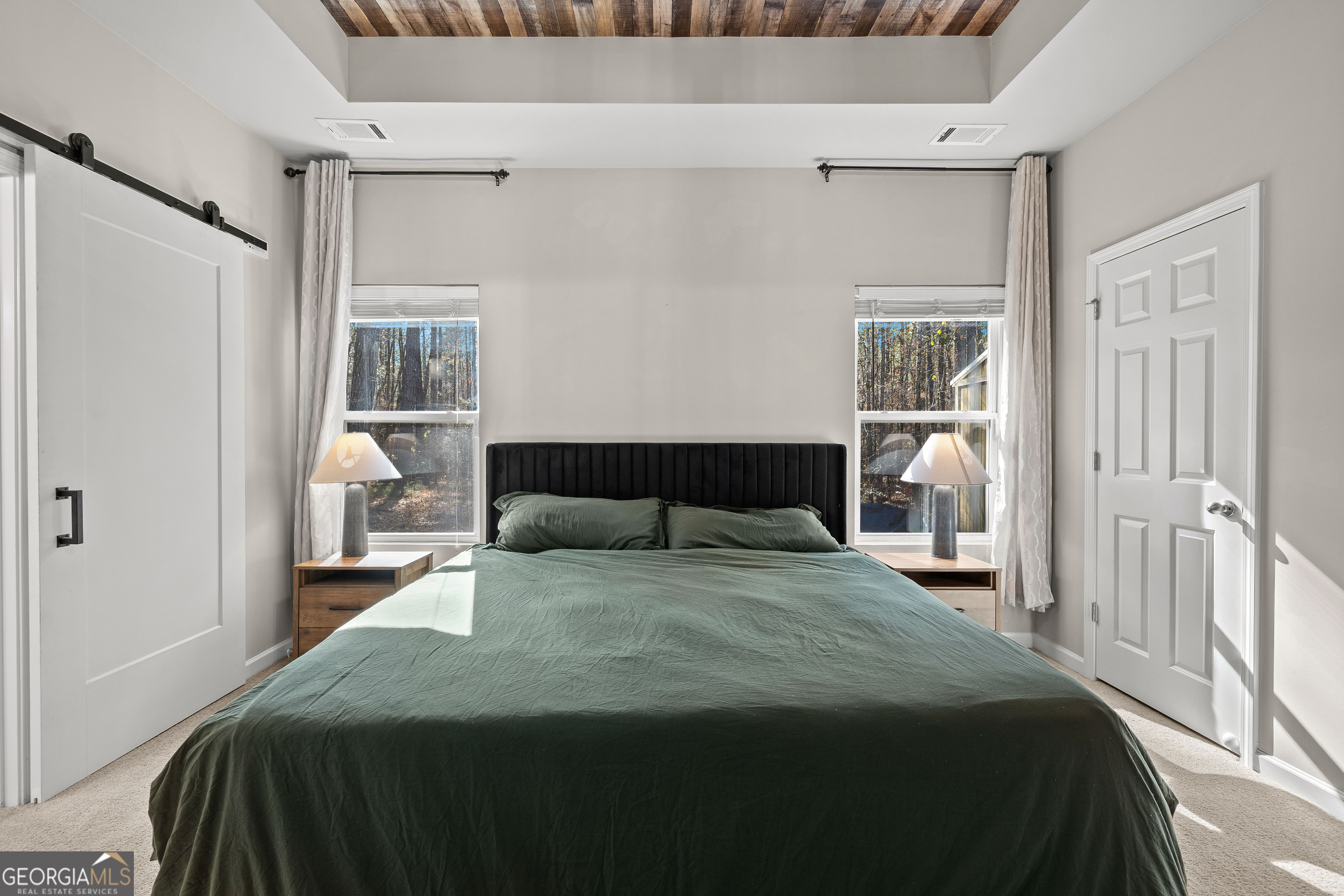 75 Homer Johnson Road Newnan, GA 30265 - Photo 22 of 51 a bedroom with a bed and a window