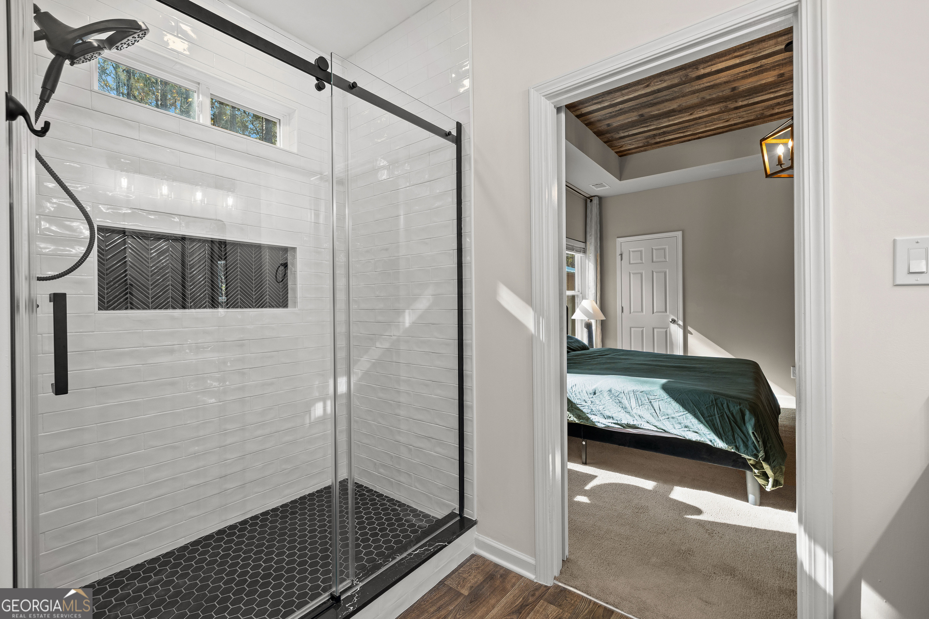 75 Homer Johnson Road Newnan, GA 30265 - Photo 25 of 51 a view of a hallway and a livingroom with furniture