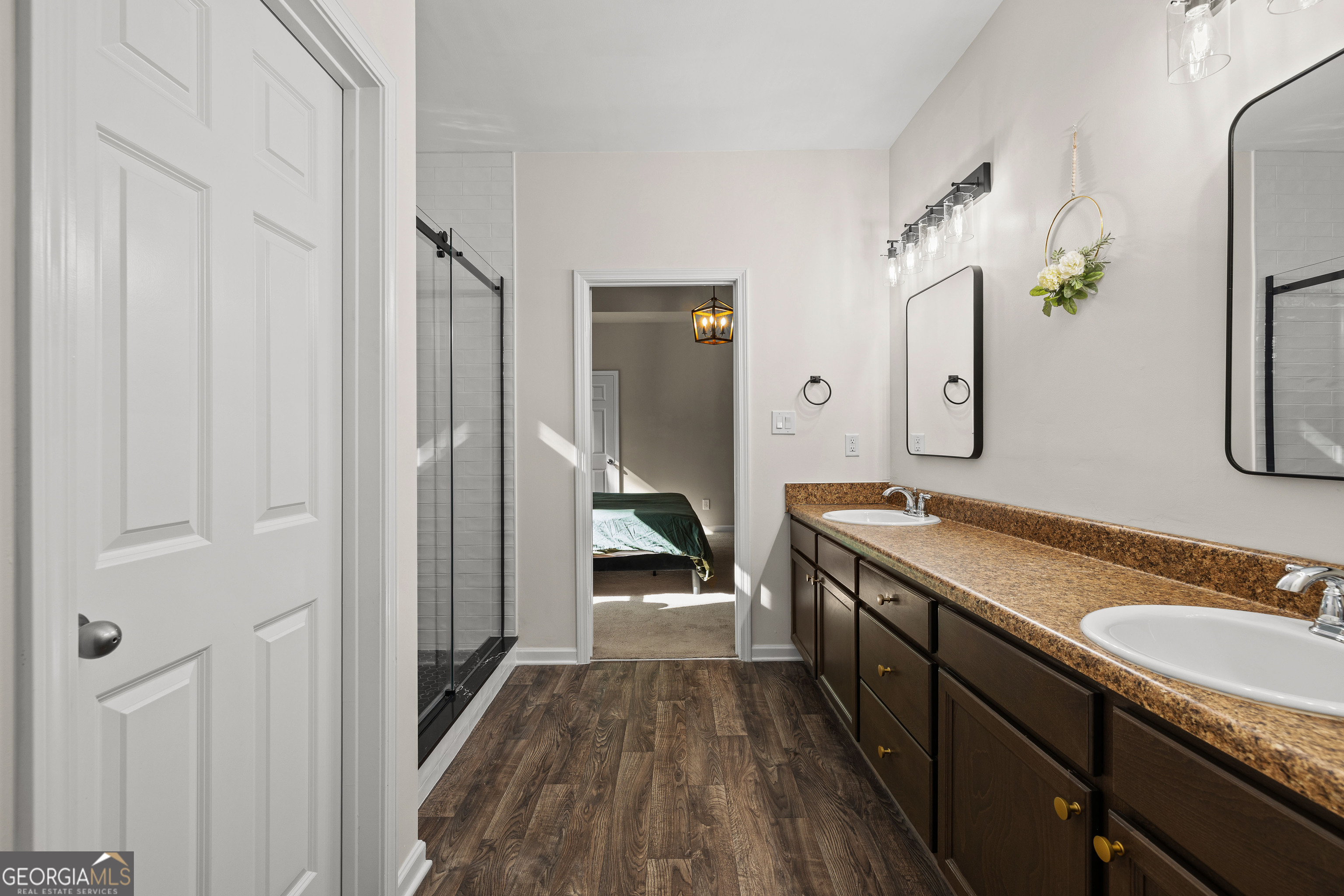 75 Homer Johnson Road Newnan, GA 30265 - Photo 26 of 51 a bathroom with a sink and a mirror