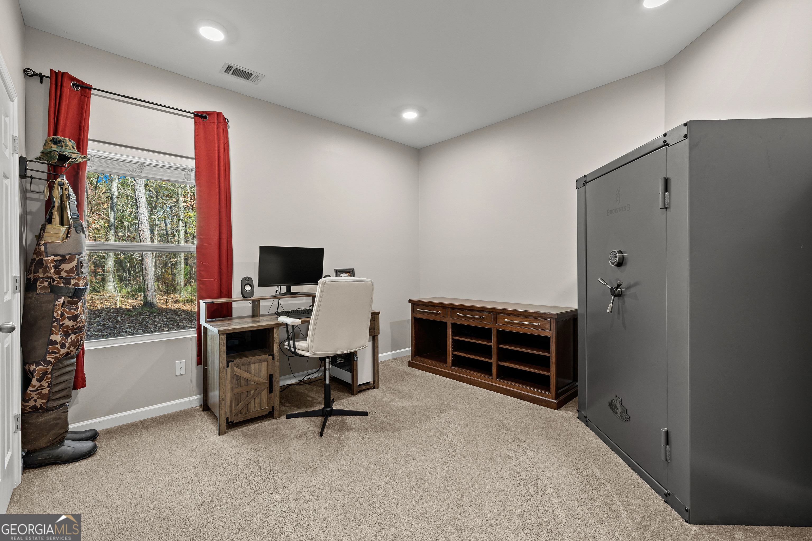 75 Homer Johnson Road Newnan, GA 30265 - Photo 35 of 51 a bedroom with furniture and a window