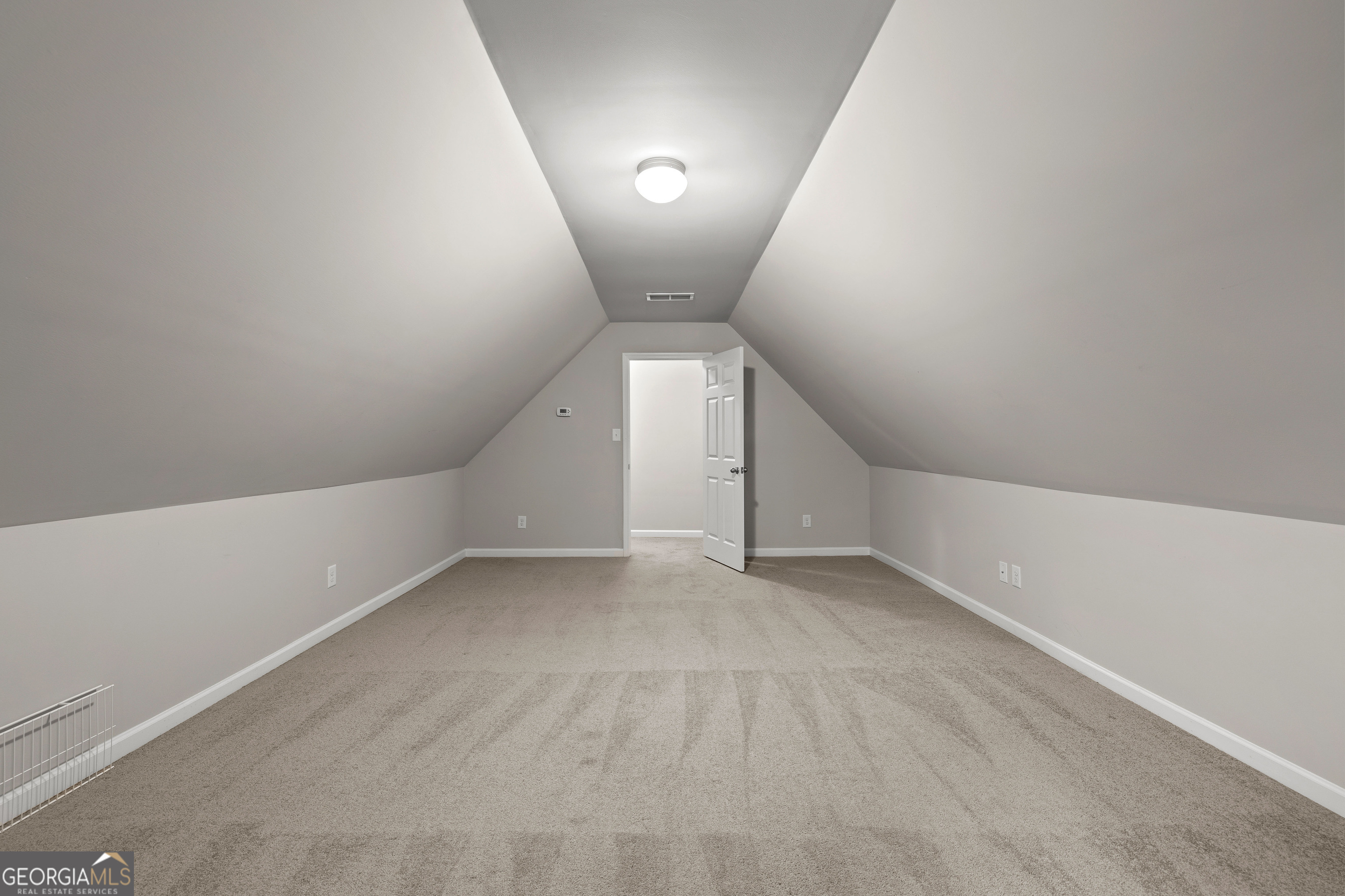 75 Homer Johnson Road Newnan, GA 30265 - Photo 40 of 51 an empty room with a bathroom