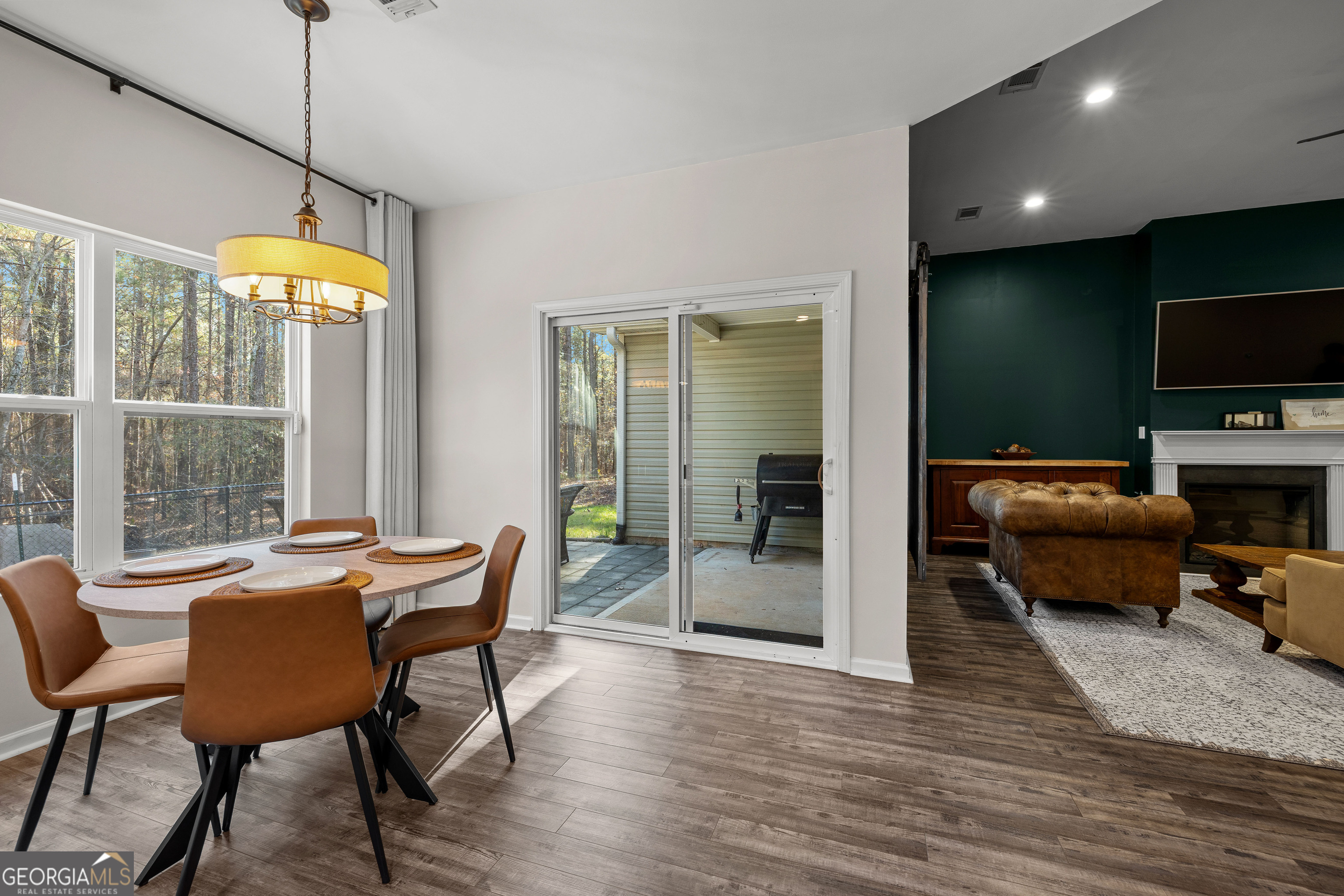 75 Homer Johnson Road Newnan, GA 30265 - Photo 41 of 51 a living room with furniture and a flat screen tv