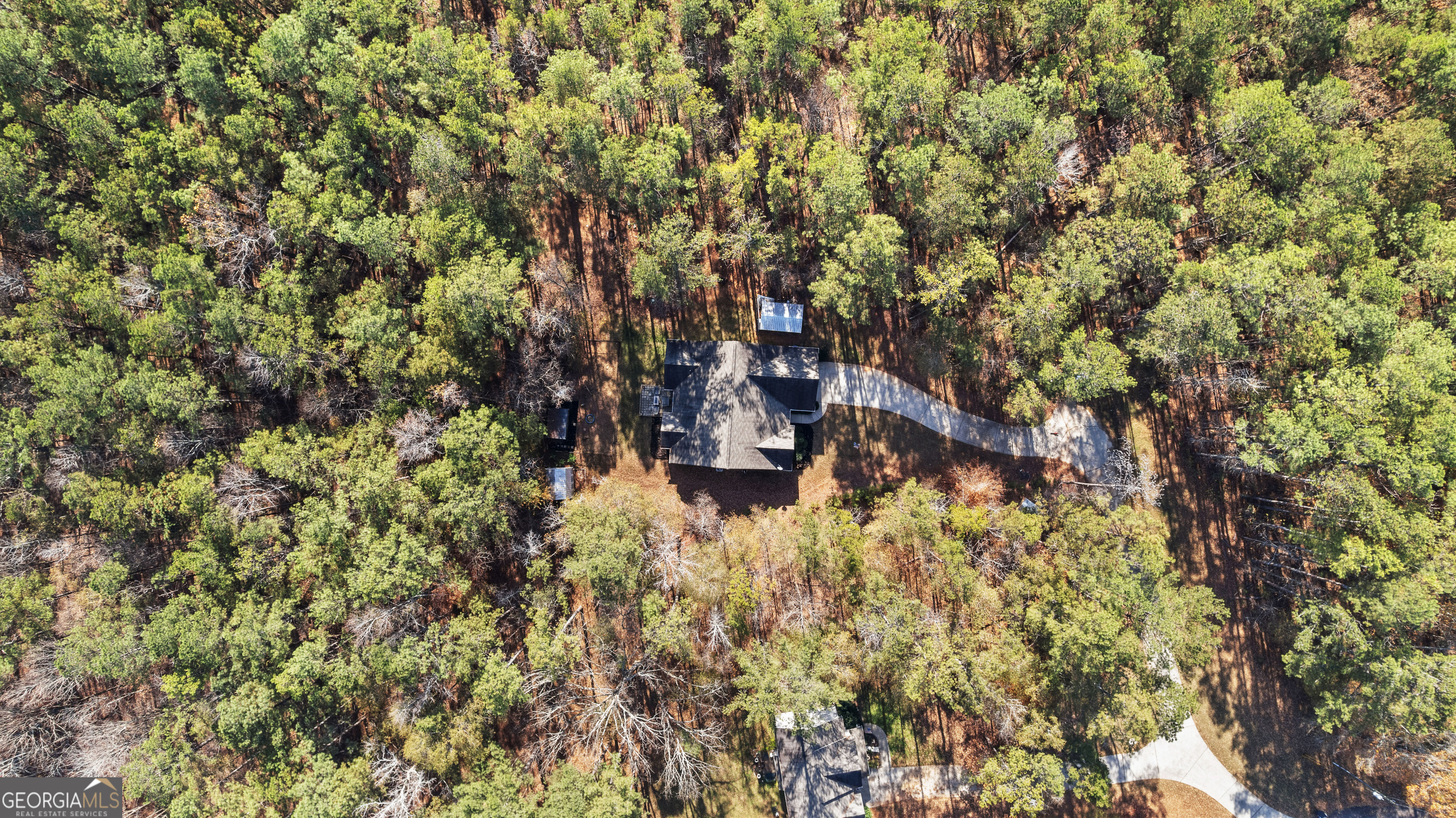 75 Homer Johnson Road Newnan, GA 30265 - Photo 6 of 51 a view of a house with a tree