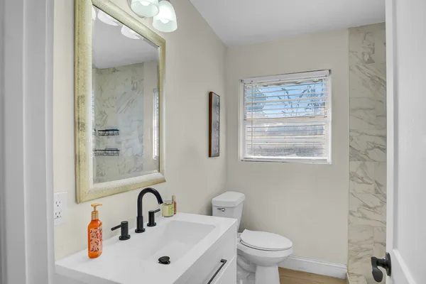 a living room with furniture and a window