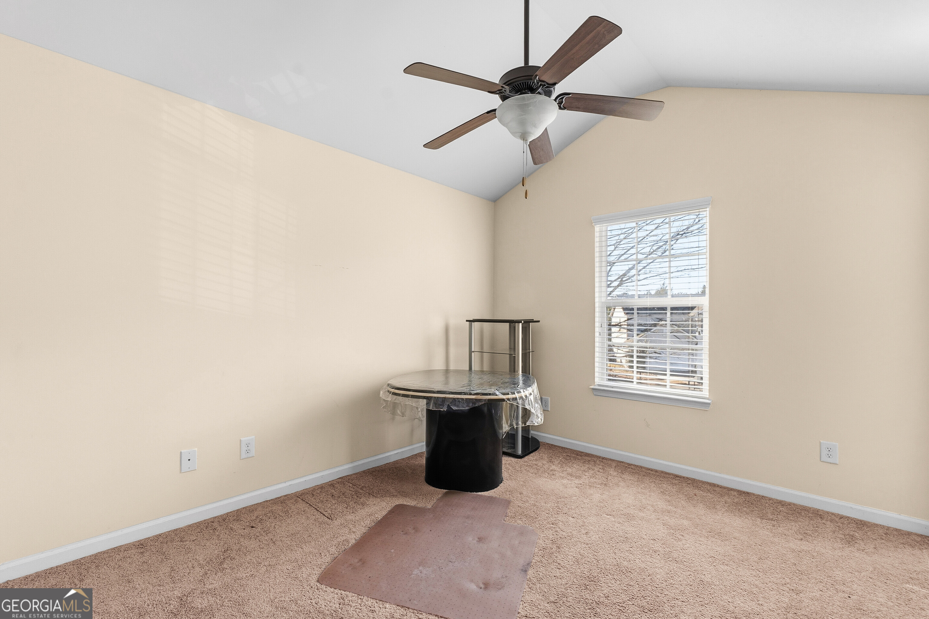 102 Steeple Court Perry, GA 31069 - Photo 28 of 37 an empty room with ceiling fan and windows