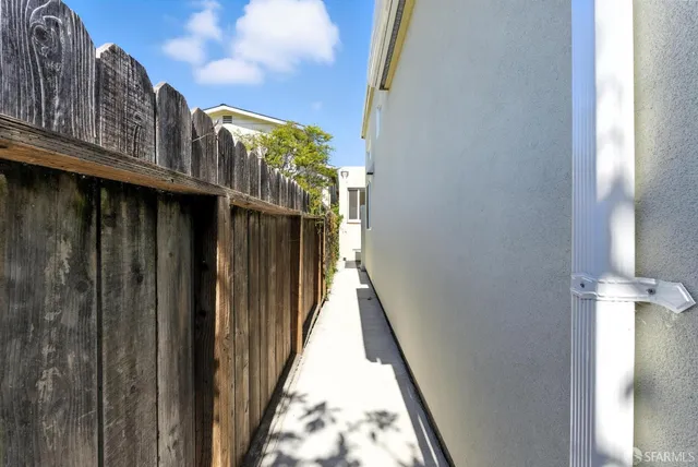 a view of balcony with wooden floor