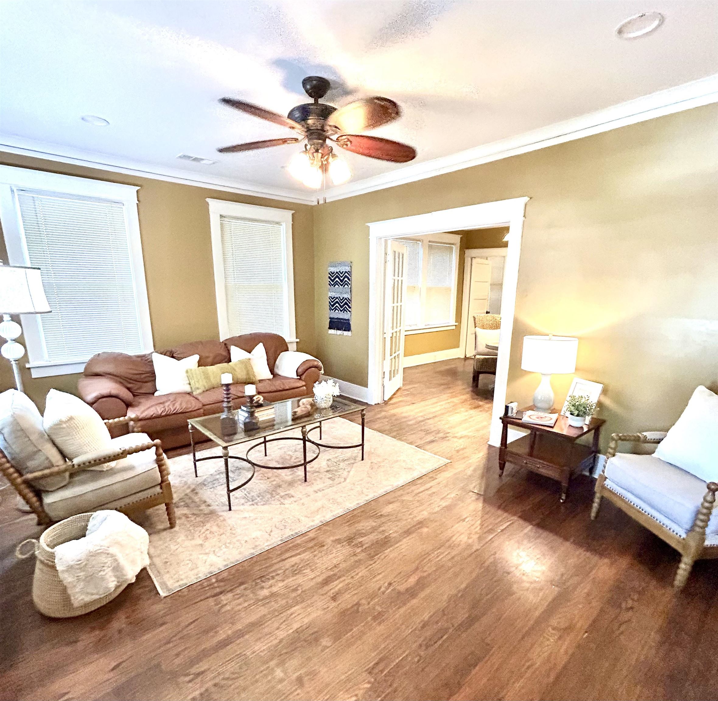 823 Cooper Street Memphis, TN 38104 - Photo 3 of 18 a living room with furniture and wooden floor