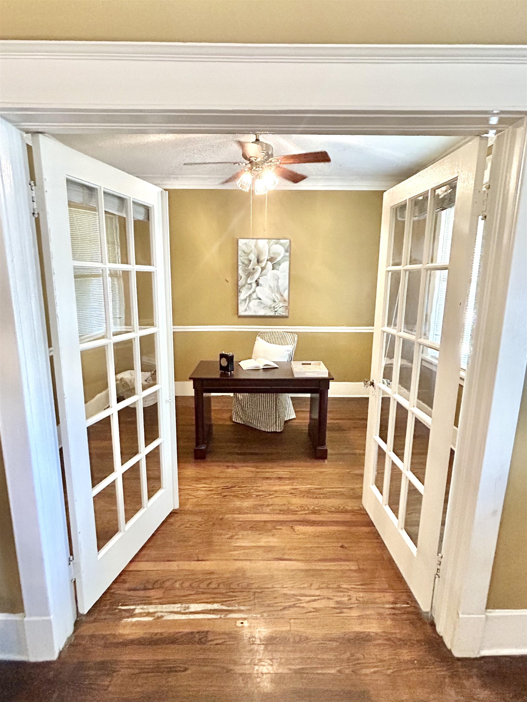 823 Cooper Street Memphis, TN 38104 - Photo 7 of 18 a view of a livingroom with wooden floor and furniture