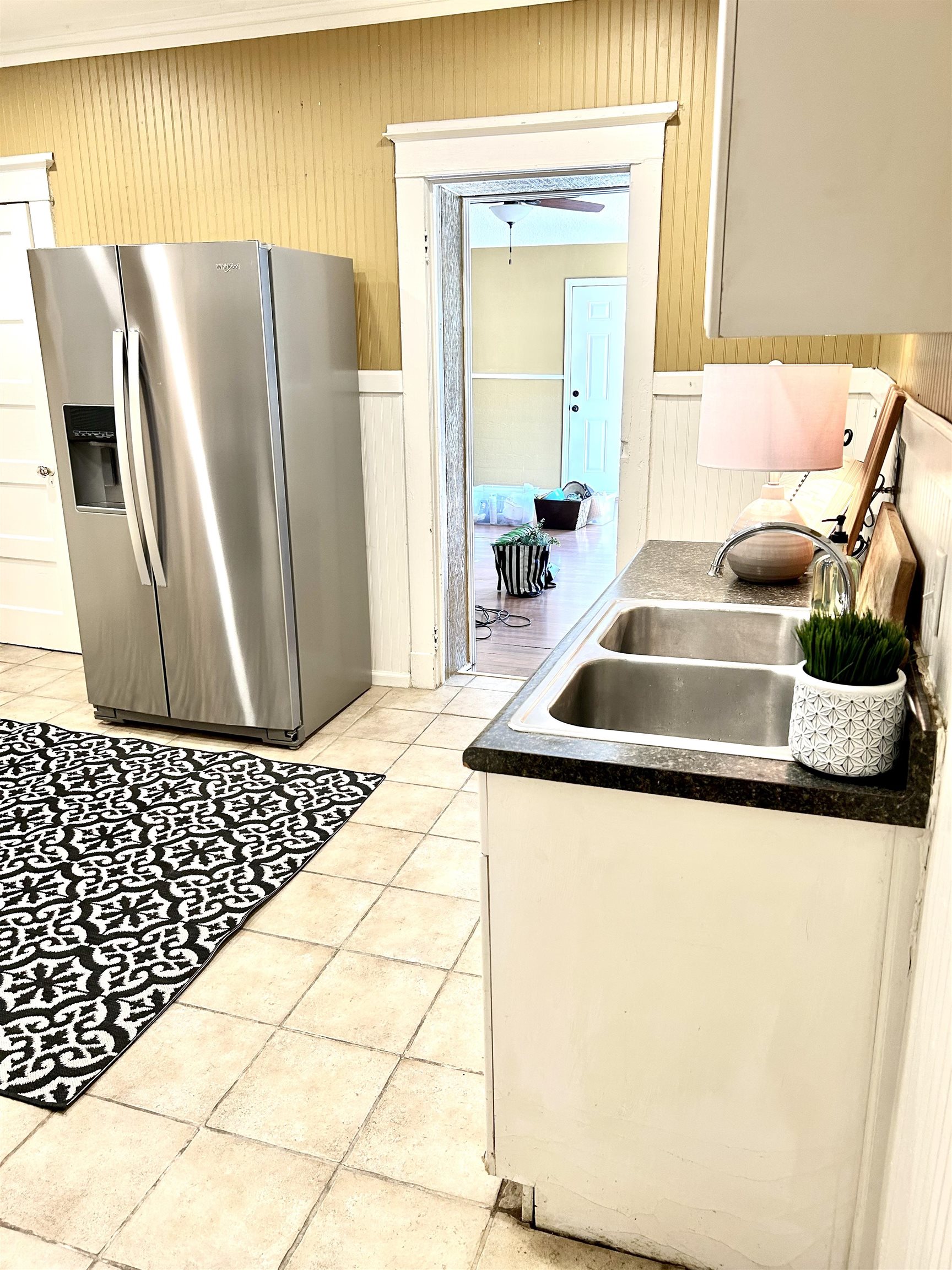 823 Cooper Street Memphis, TN 38104 - Photo 9 of 18 a kitchen with a refrigerator and a sink