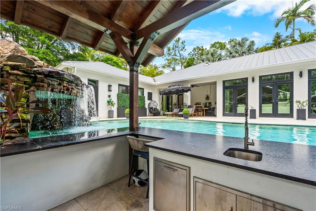 6370 Hunters Road Naples, FL 34109 - Photo 41 of 50 Outdoor Swim Up Bar and Grill
