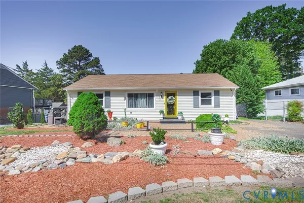 a front view of a house with a patio