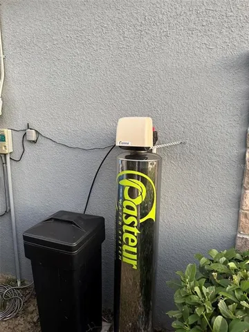 a bathroom with a toilet and a sink