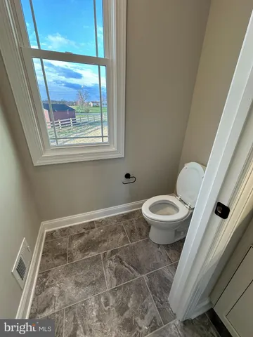 a bathroom with a toilet
