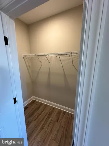 a bathroom with a glass door shower