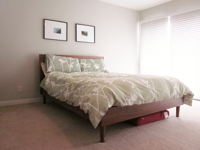 1812 South State Street, Unit 9 Chicago, IL 60616 - Photo 11 of 15 a large bed sitting in a bedroom next to a window