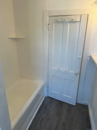 a bathroom with a bathtub