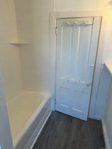 a bathroom with a bathtub