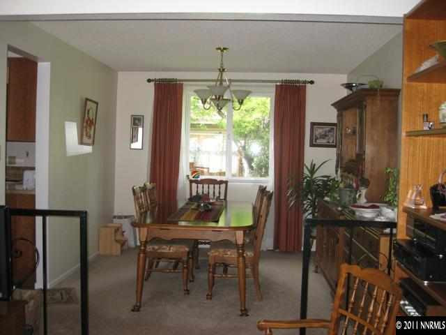 3035 Randolph Drive Reno, NV 89502 - Photo 4 of 13 a view of a dining room with furniture window and outside view