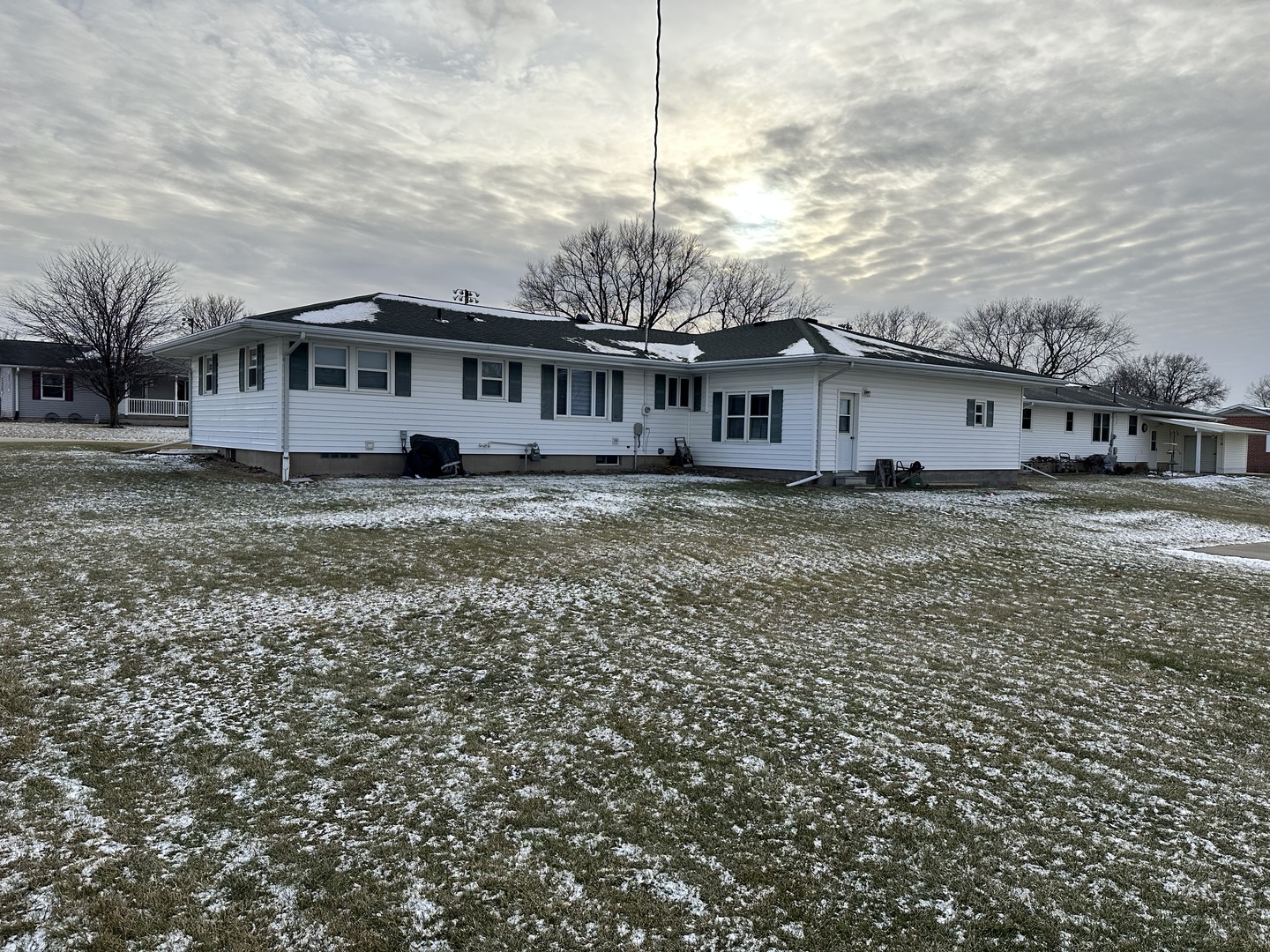 402 West South Street Preston, IA 52069 - Photo 2 of 21 a view of a house next to a big yard
