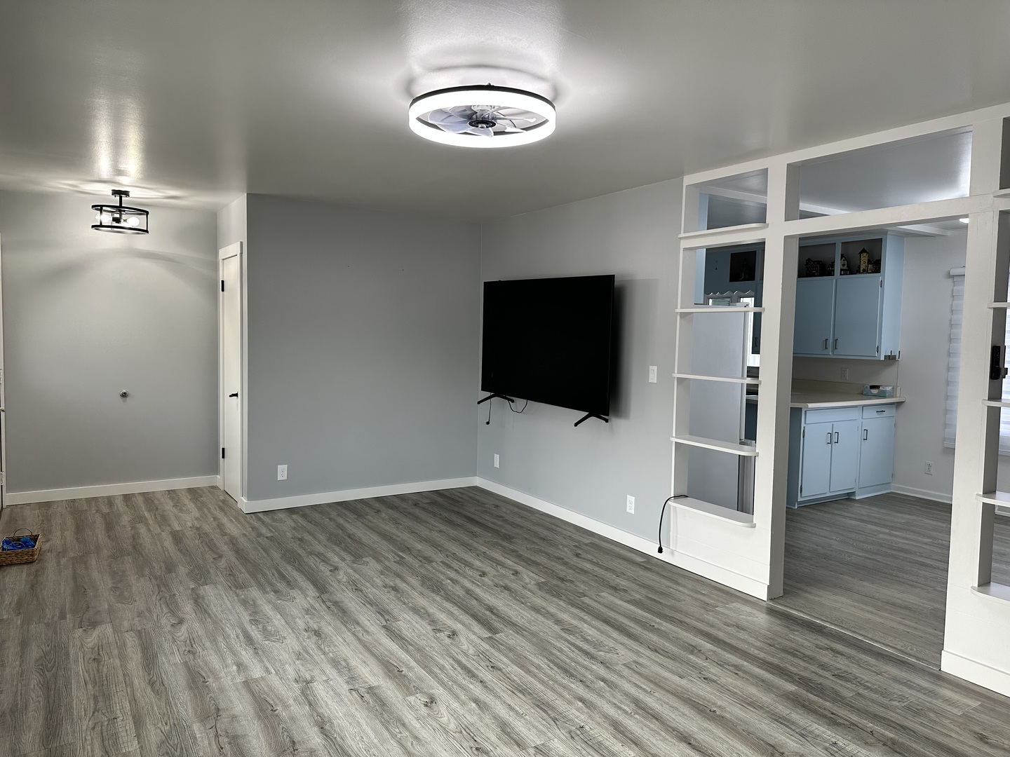 402 West South Street Preston, IA 52069 - Photo 9 of 21 wooden floor in an empty room with a bathroom