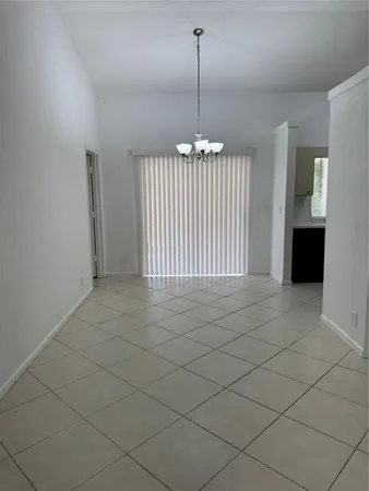 a view of empty room and garage