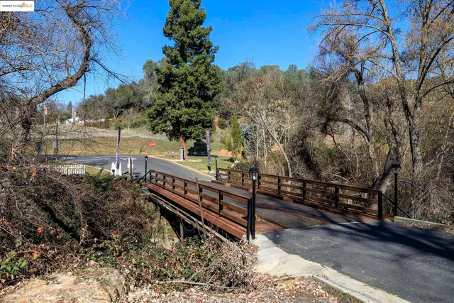 a view of a playground with basketball court