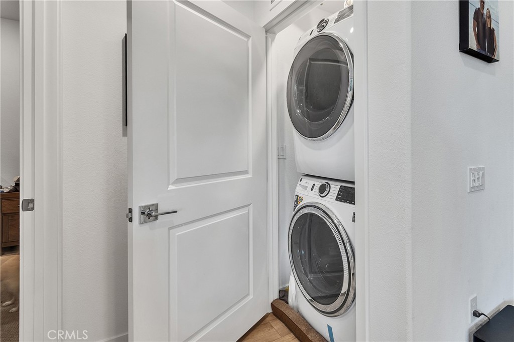 1200 Lasso Way, Unit 105 Rancho Mission Viejo, CA 92694 - Photo 14 of 43 a utility room with dryer and washer