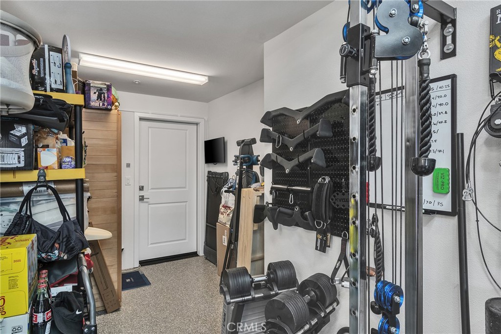 1200 Lasso Way, Unit 105 Rancho Mission Viejo, CA 92694 - Photo 19 of 43 a view of a room with gym equipment