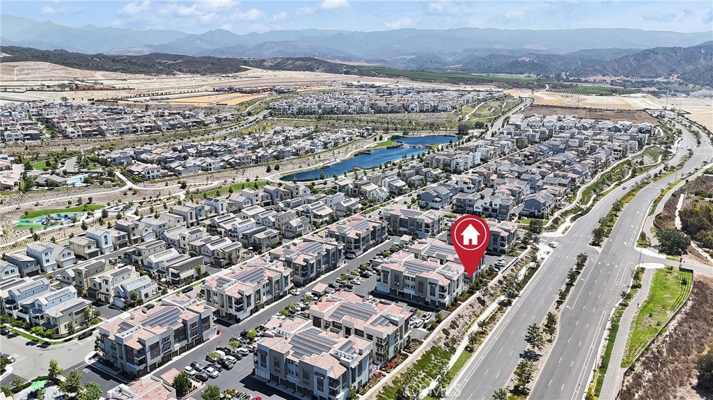 1200 Lasso Way, Unit 105 Rancho Mission Viejo, CA 92694 - Photo 22 of 43 a city view with tall buildings