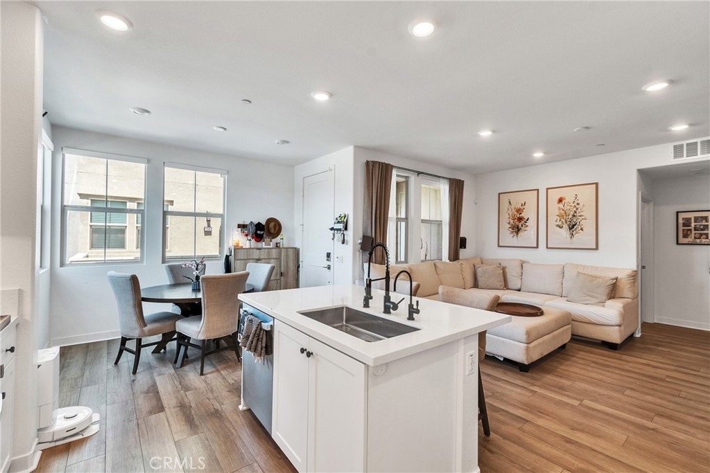1200 Lasso Way, Unit 105 Rancho Mission Viejo, CA 92694 - Photo 43 of 43 a living room with furniture and wooden floor
