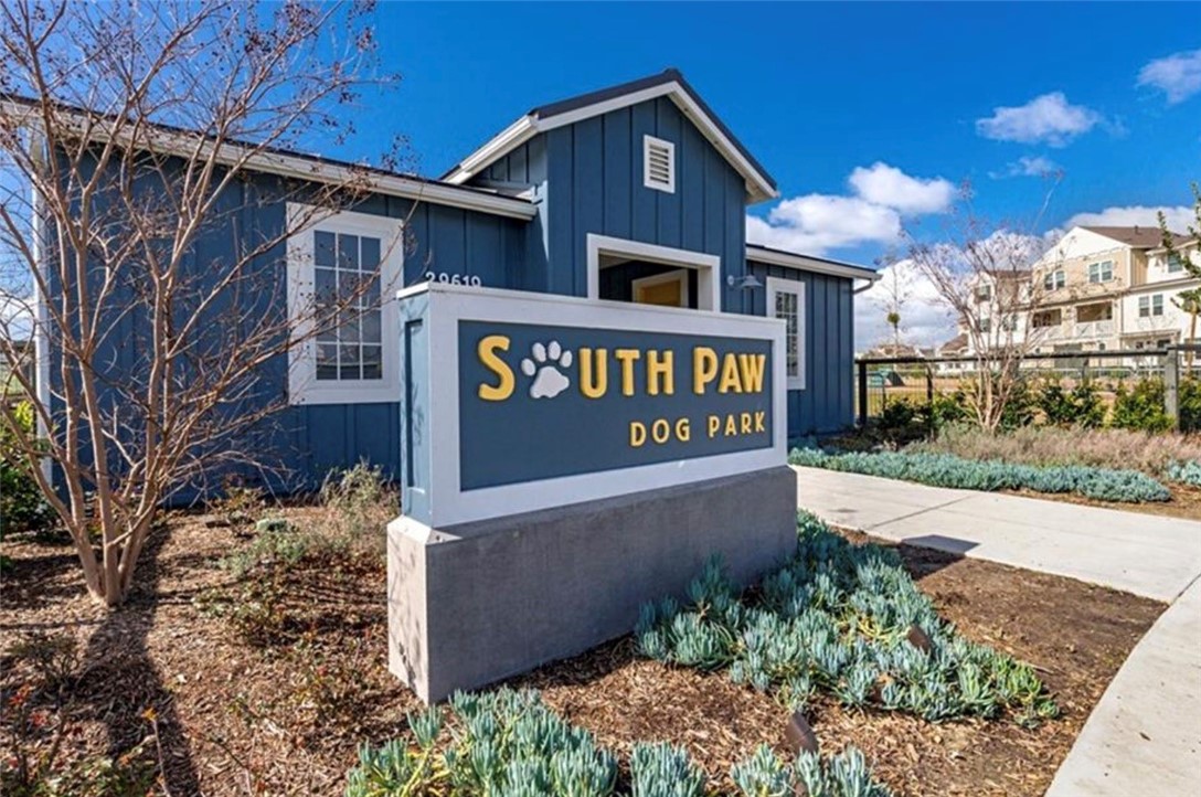 1200 Lasso Way, Unit 105 Rancho Mission Viejo, CA 92694 - Photo 33 of 43 a sign on the side of a building