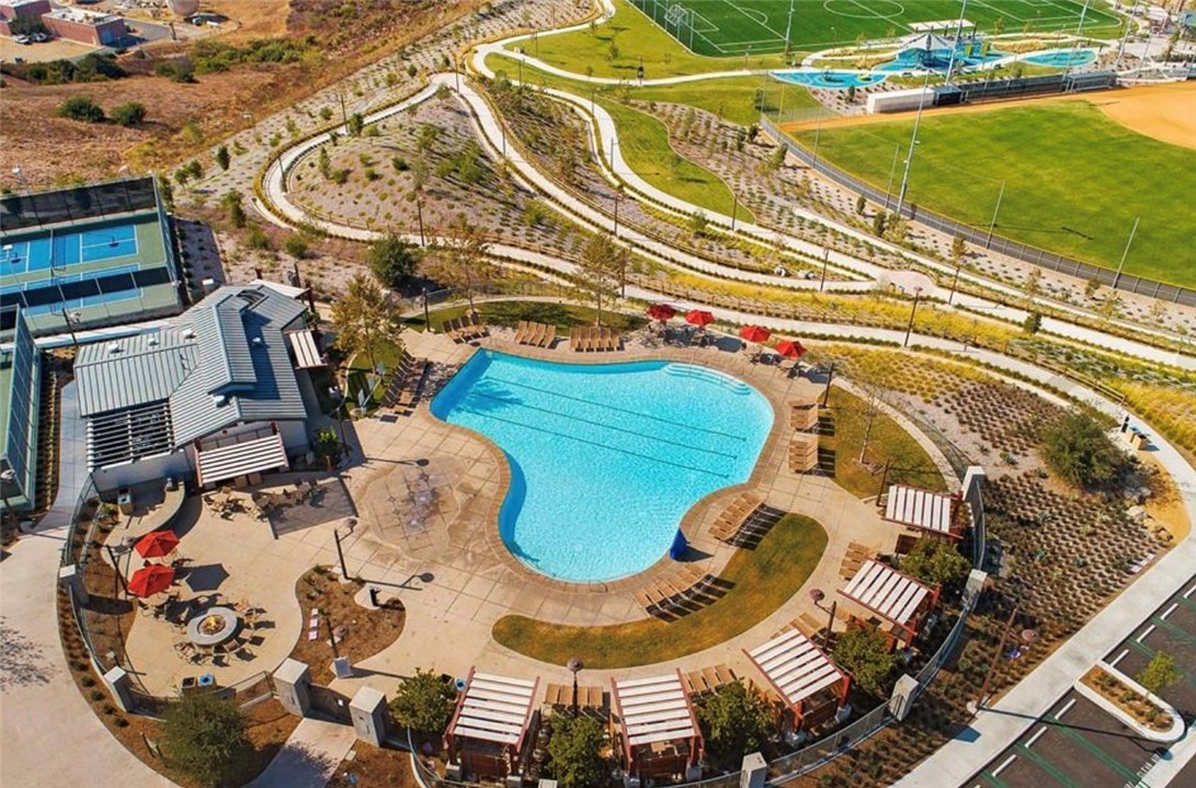 1200 Lasso Way, Unit 105 Rancho Mission Viejo, CA 92694 - Photo 34 of 43 a view of a swimming pool with outdoor seating