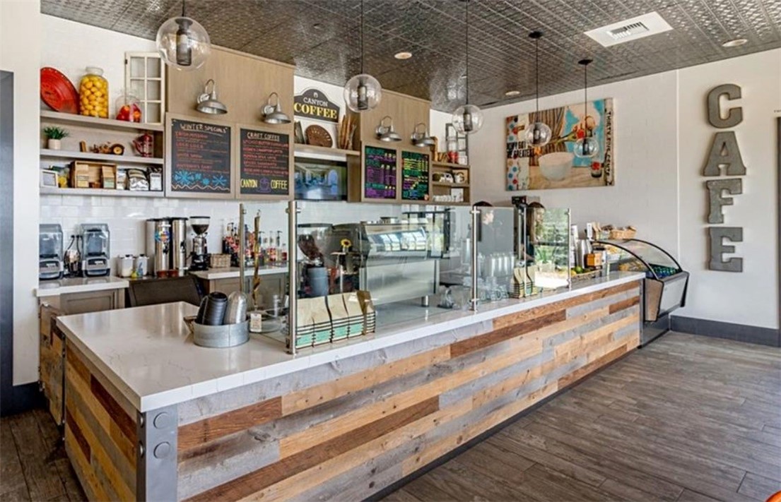 1200 Lasso Way, Unit 105 Rancho Mission Viejo, CA 92694 - Photo 41 of 43 a kitchen with lots of counter top space and cabinets