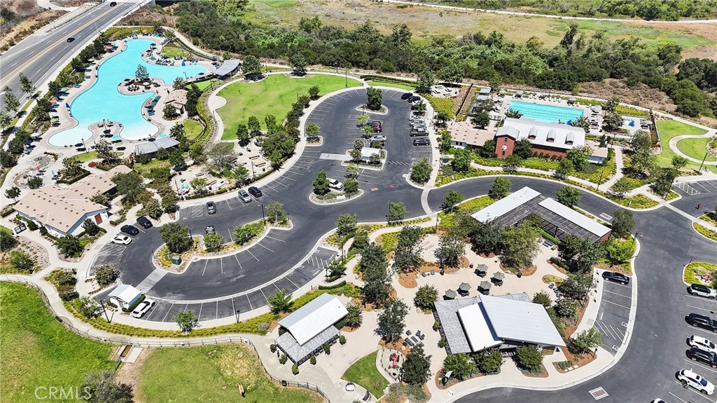 1200 Lasso Way, Unit 105 Rancho Mission Viejo, CA 92694 - Photo 8 of 43 an aerial view of a swimming pool and outdoor space