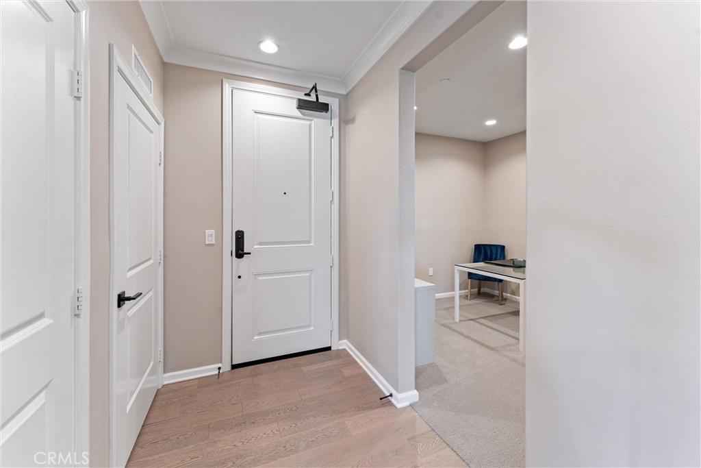 260 Buena Vida Drive, Unit 301 Brea, CA 92823 - Photo 5 of 50 a view of a bathroom with a sink and a mirror