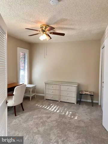 a room with furniture and a window