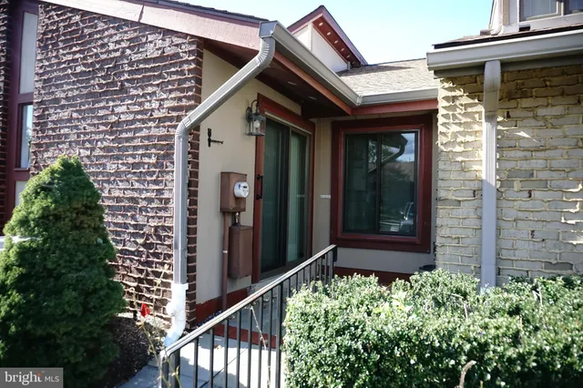 front view of a house with a large windows