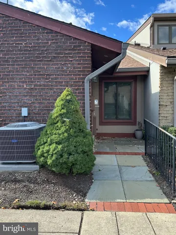 a view of a pathway along the building