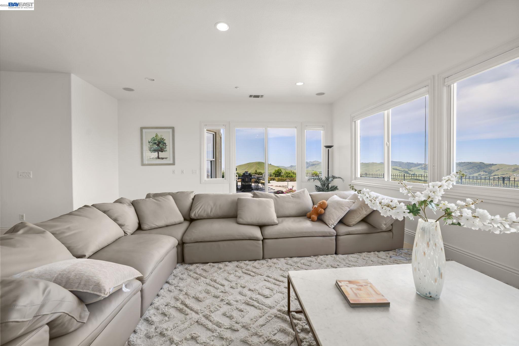 950 Winsford Court San Ramon, CA 94583 - Photo 21 of 68 a living room with furniture and a large window