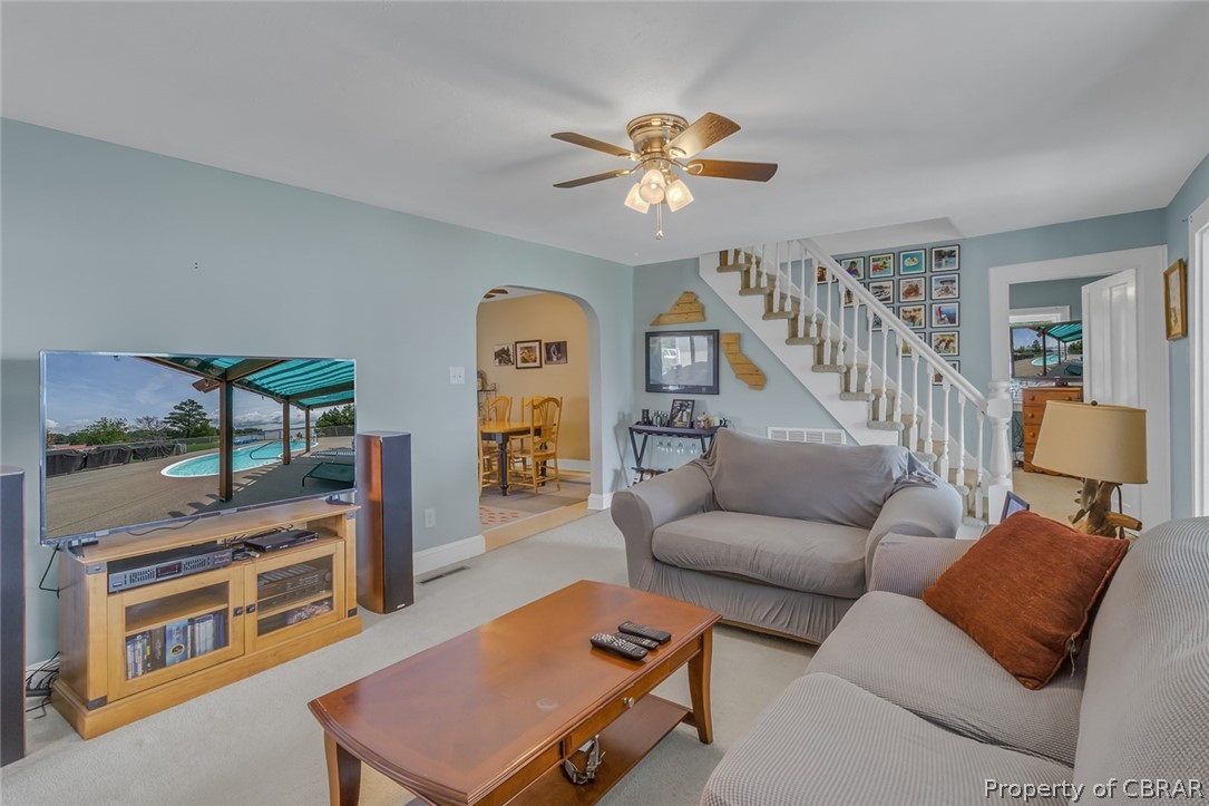 314 Callis Road Lancaster, VA 22503 - Photo 26 of 41 a living room with furniture and a wooden floor
