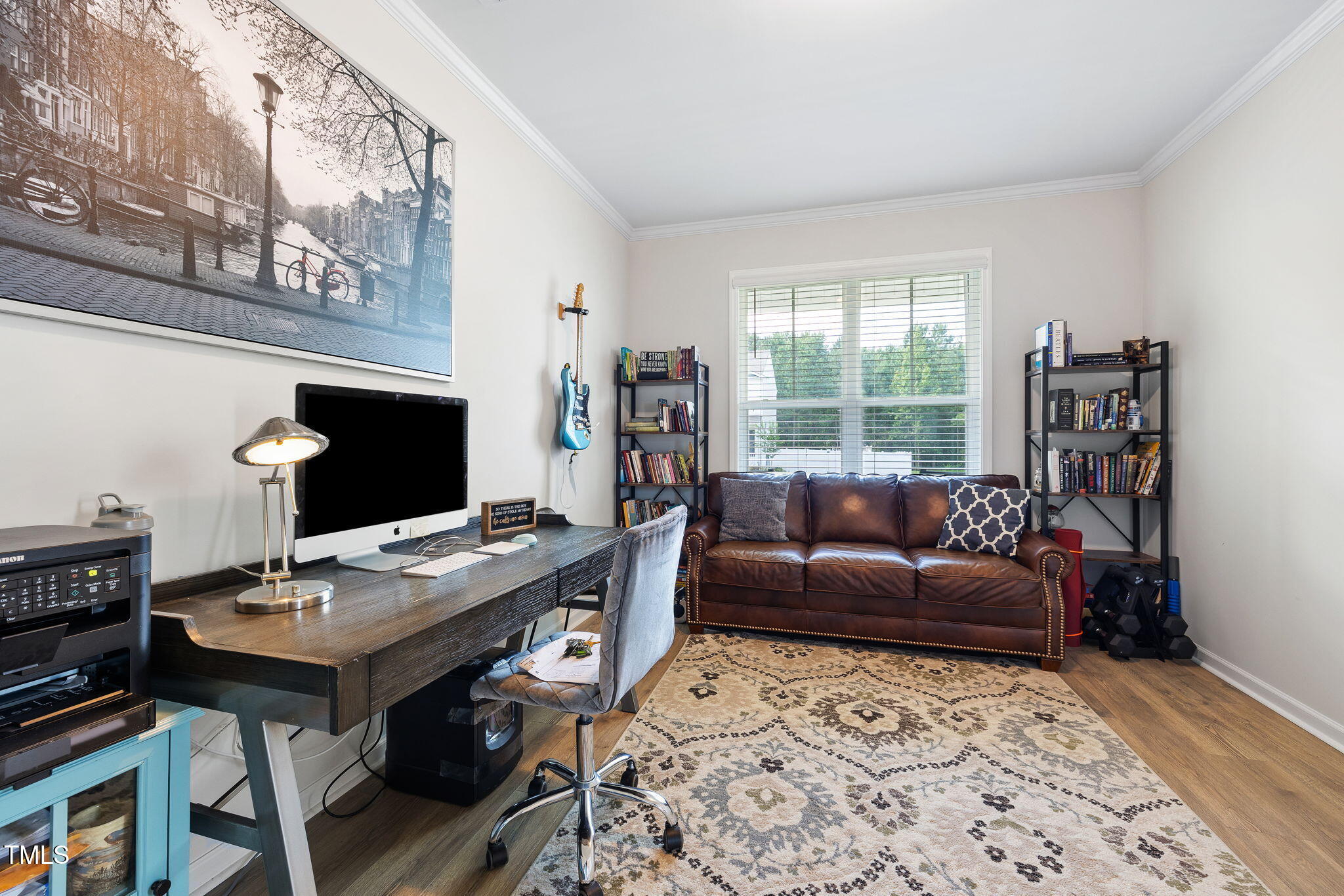 95 Madden Rose Loop Garner, NC 27529 - Photo 13 of 51 a view of a workspace with furniture and a window
