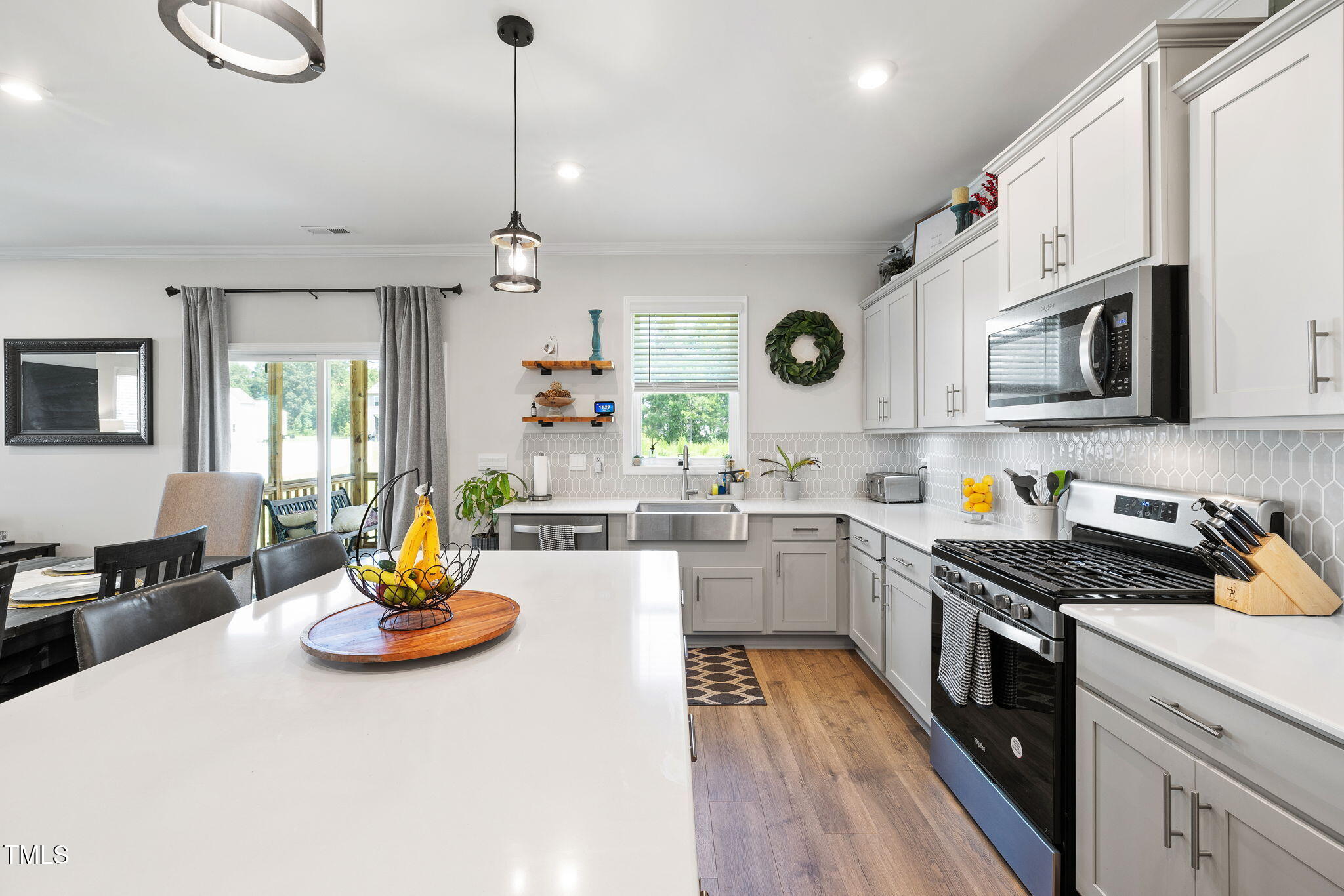 95 Madden Rose Loop Garner, NC 27529 - Photo 19 of 51 a kitchen with a sink appliances and cabinets