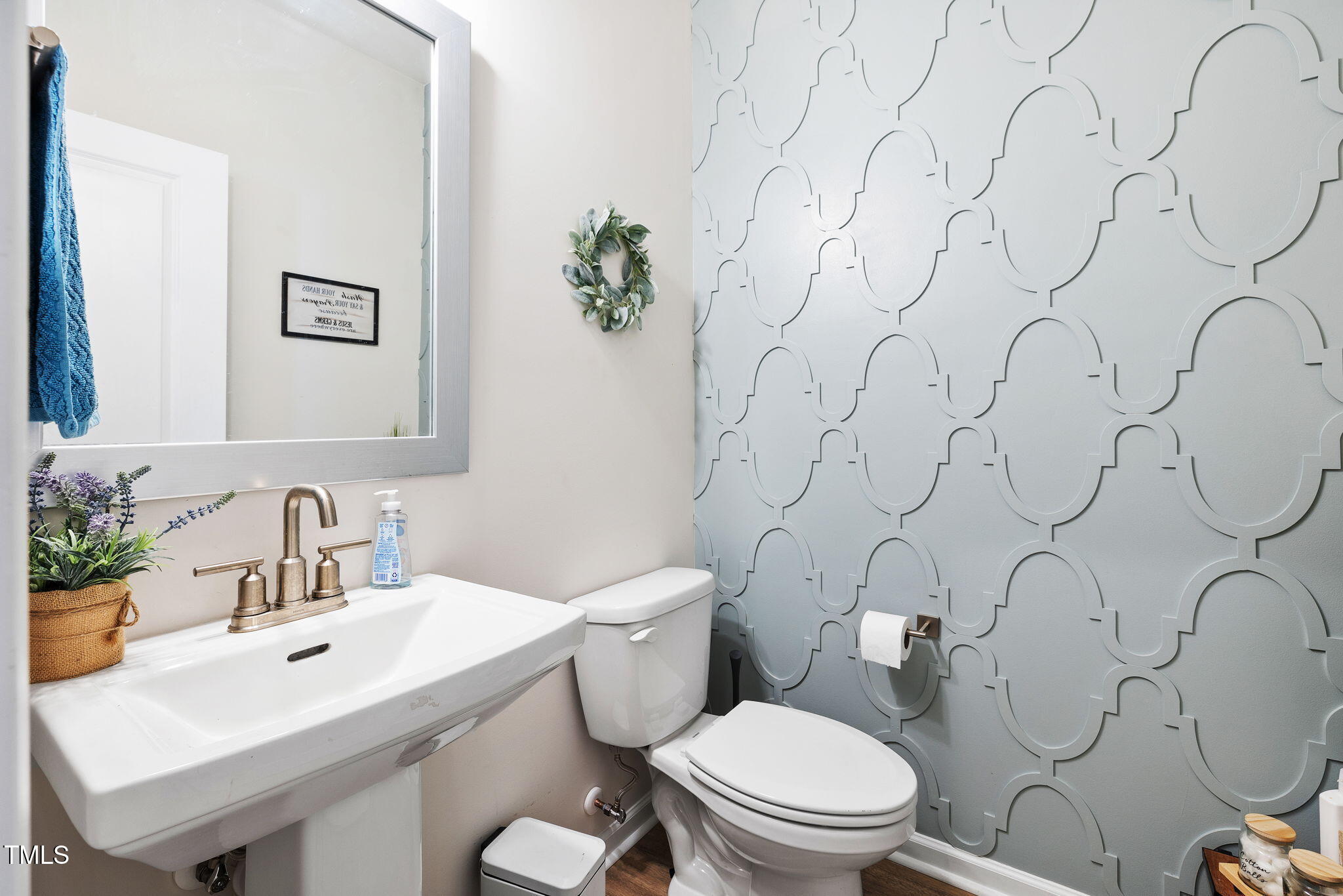 95 Madden Rose Loop Garner, NC 27529 - Photo 25 of 51 a bathroom with a toilet sink and mirror