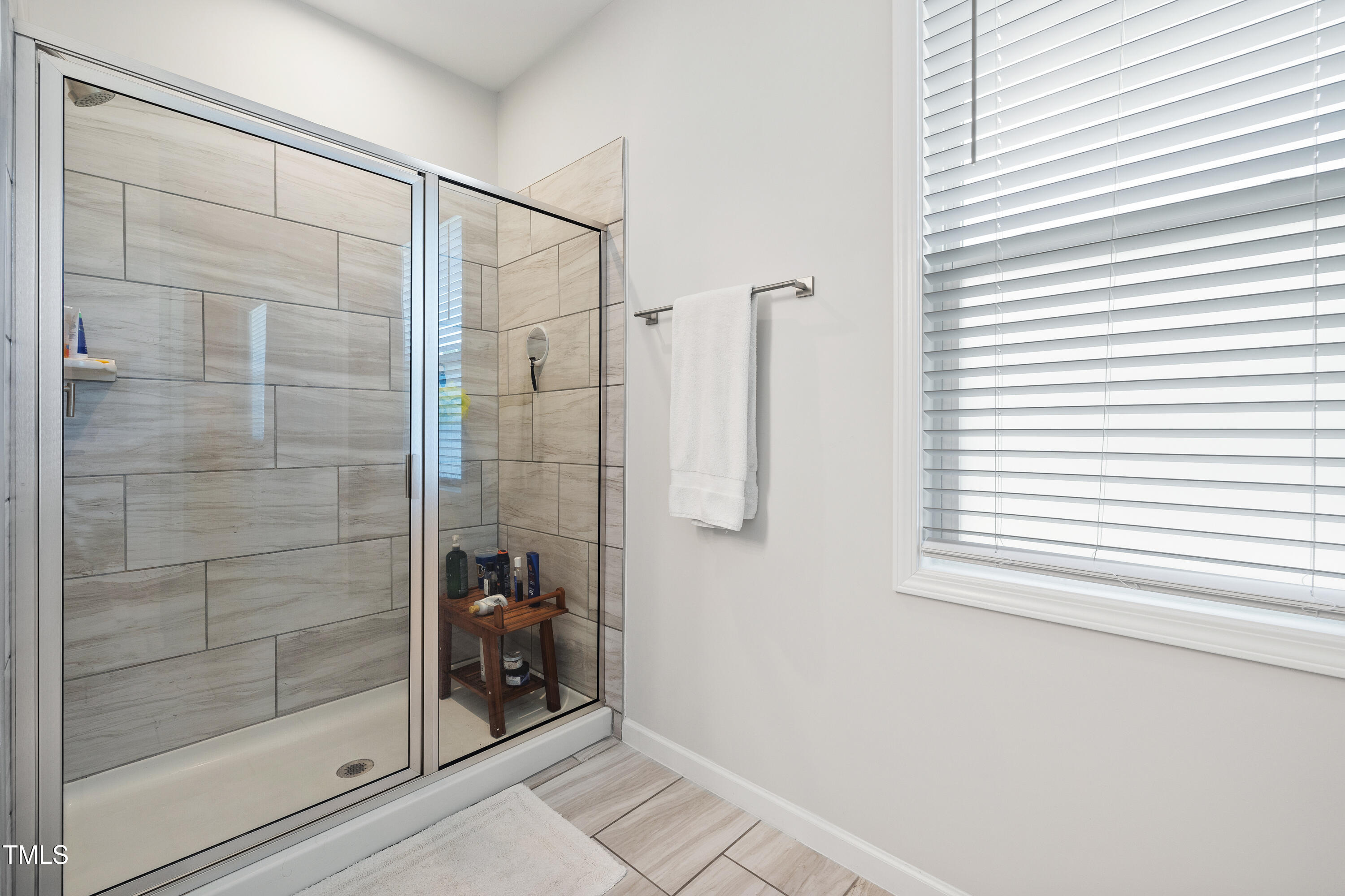 95 Madden Rose Loop Garner, NC 27529 - Photo 33 of 51 a bathroom with a shower