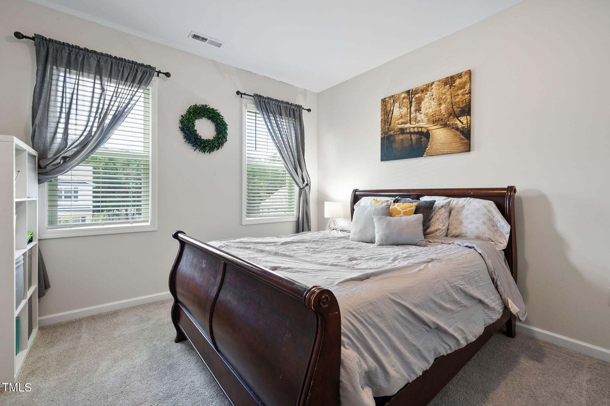 95 Madden Rose Loop Garner, NC 27529 - Photo 35 of 51 a bedroom with a bed and window