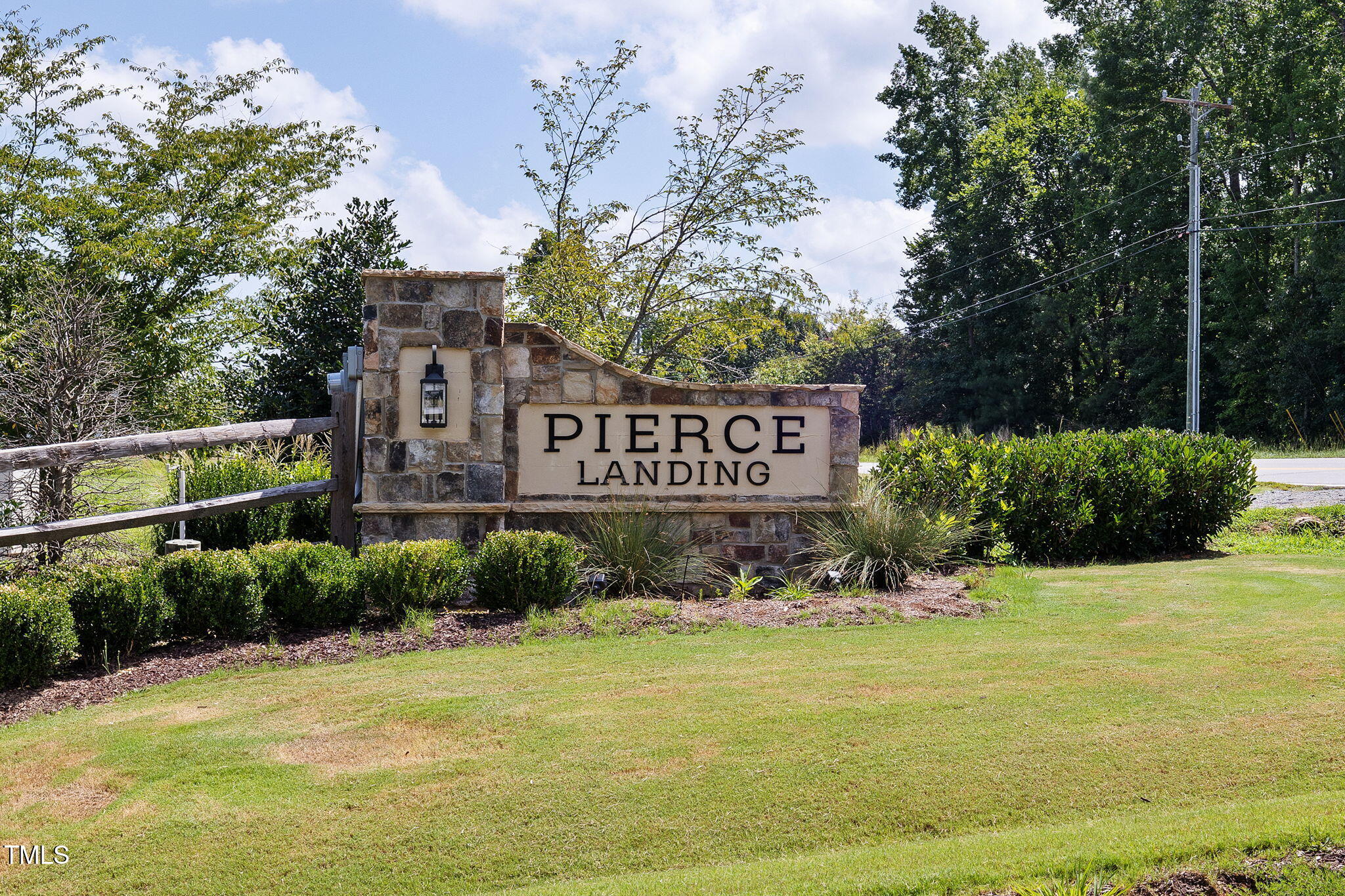 95 Madden Rose Loop Garner, NC 27529 - Photo 47 of 51 a view of a sign board with yard