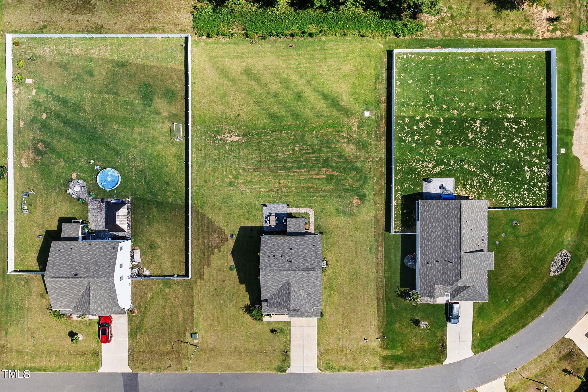 95 Madden Rose Loop Garner, NC 27529 - Photo 5 of 51 an aerial view of houses with yard