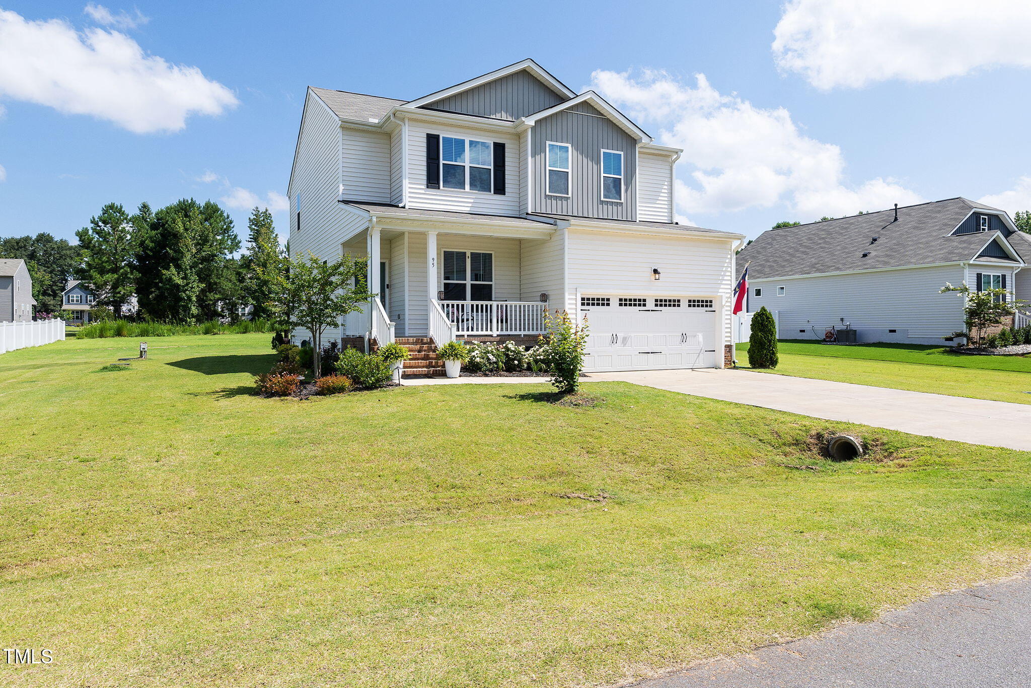 95 Madden Rose Loop Garner, NC 27529 - Photo 6 of 51 a view of a house with pool and a yard