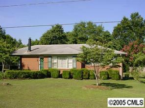 511 Shue Road China Grove, NC 28023 - Photo 1 of 8 a view of a house with a yard and a garden